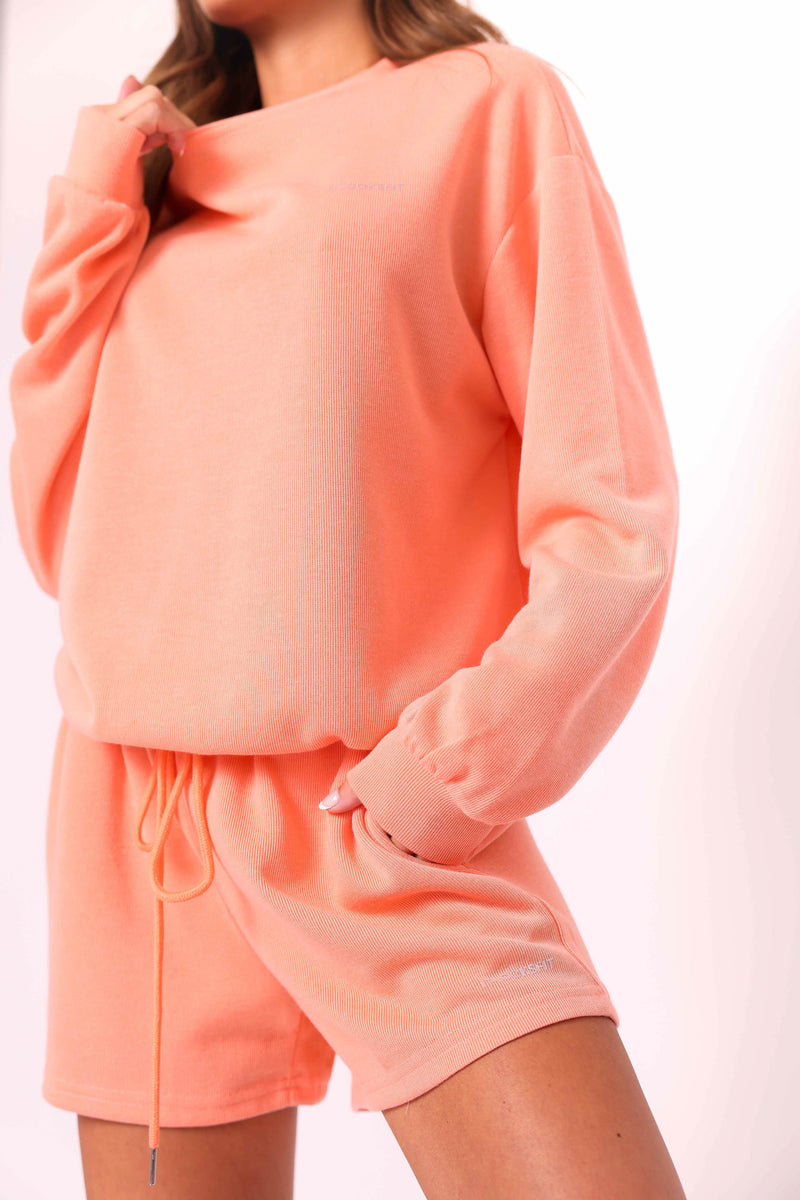 Essentials Peach Coral Boyfriend Style Sweater and Drawstring Shorts Set